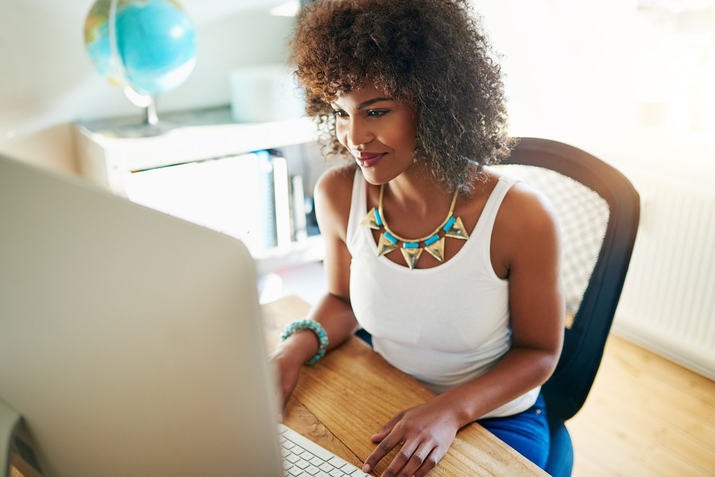 Pretty Young Woman Working on a Start up Business